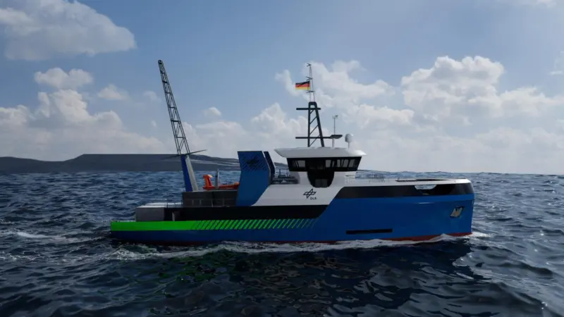 The image shows a ship model of the new research vessel at sea