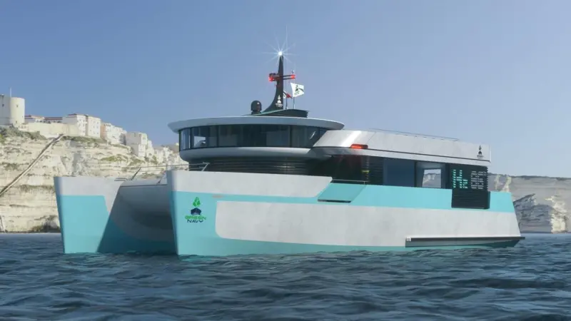 The image shows a SECO Marine catamaran built for Green Navy on the water
