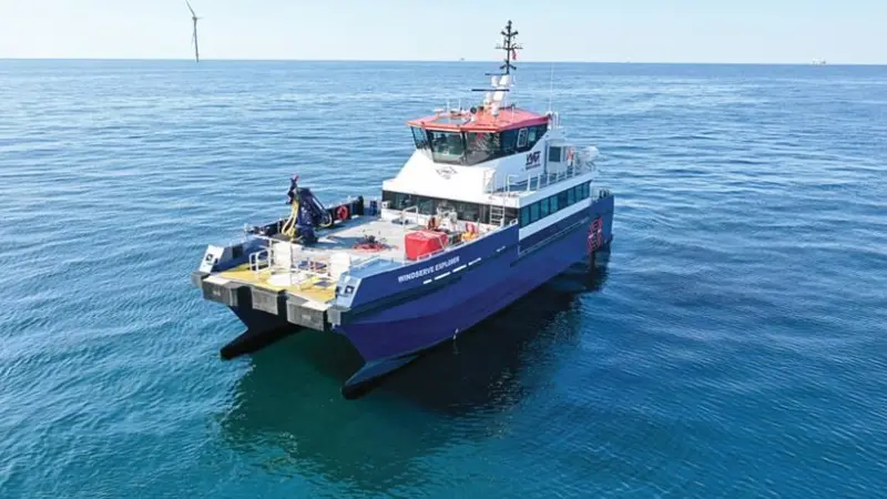 The image shows a Damen 2610 Fast Crew Supplier on the water