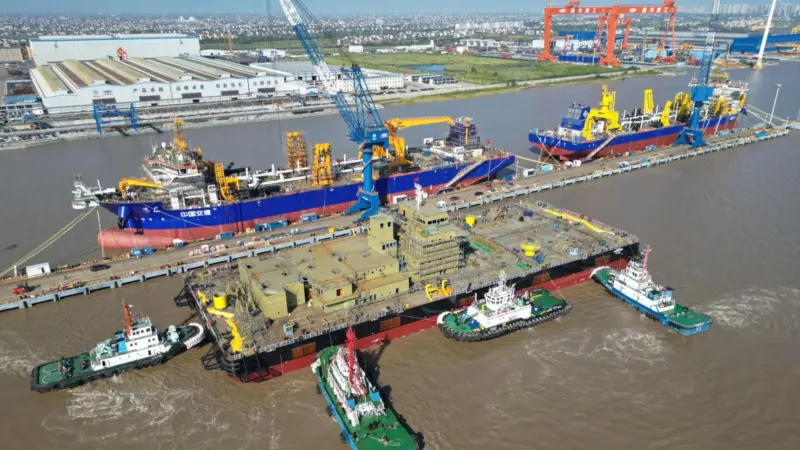 The image shows the Alnokhada floating crane in construction
