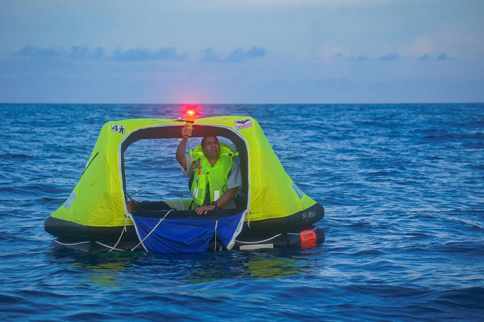 ACR ResQFlare PRO electronic boat flare in use in a liferaft