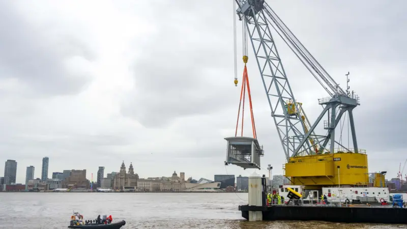 The picture shows the Lara 1 crane at work on the Woodside Linkspan Bridge installation