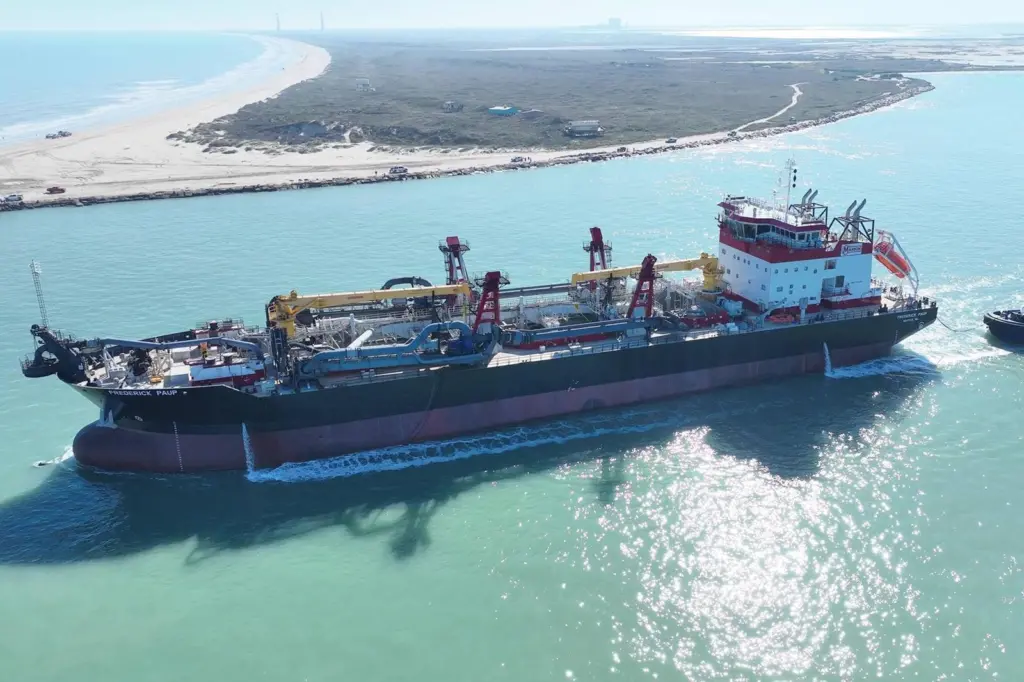 A picture of the Frederick Paup dredger on the water