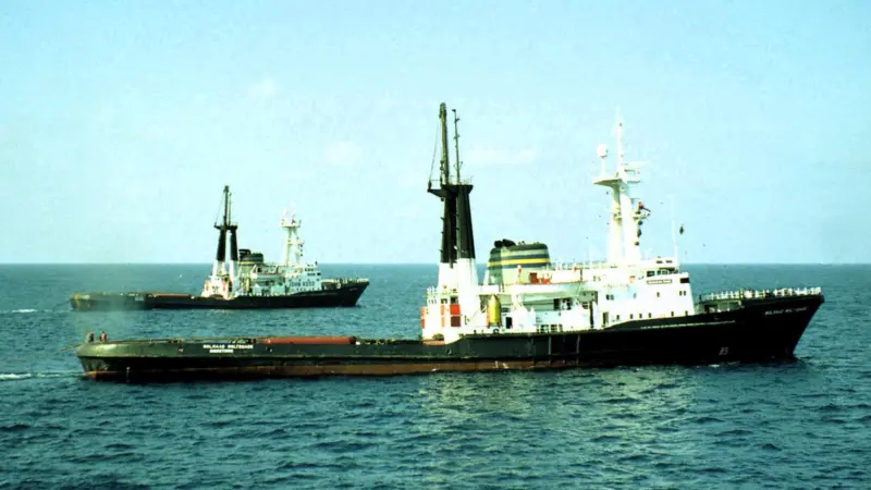 A rare picture of the South African twins towing in tandem (Lloyd Merriman)