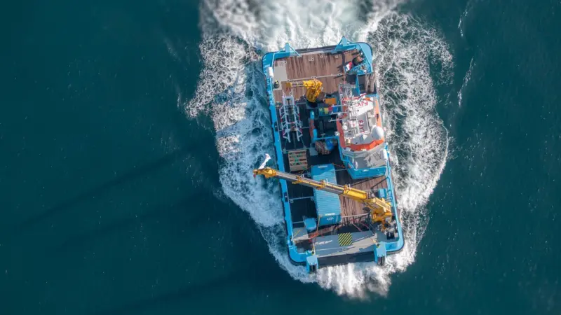 The image shows a Jifmar vessel on the water