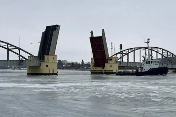 The tugboat 'Valdemar' sails through the Guldborg Bridge between Lolland and Falster Photo The Danish Armed Forces