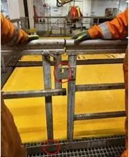 Corroded hinge on safety gate