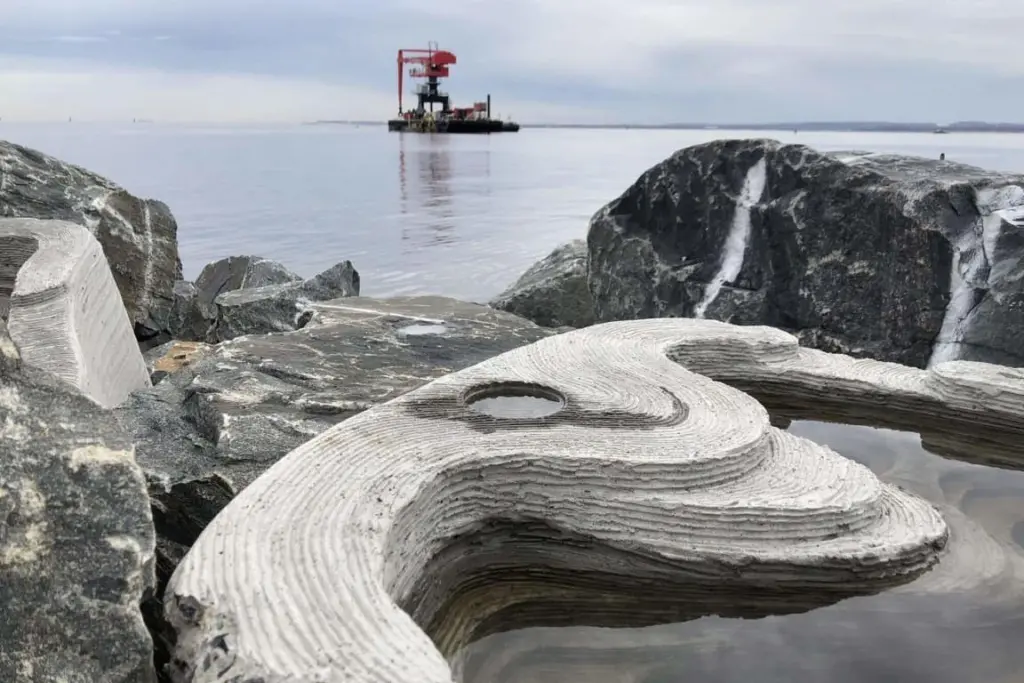 The image shows tide pools integrated into the rock breakwaters