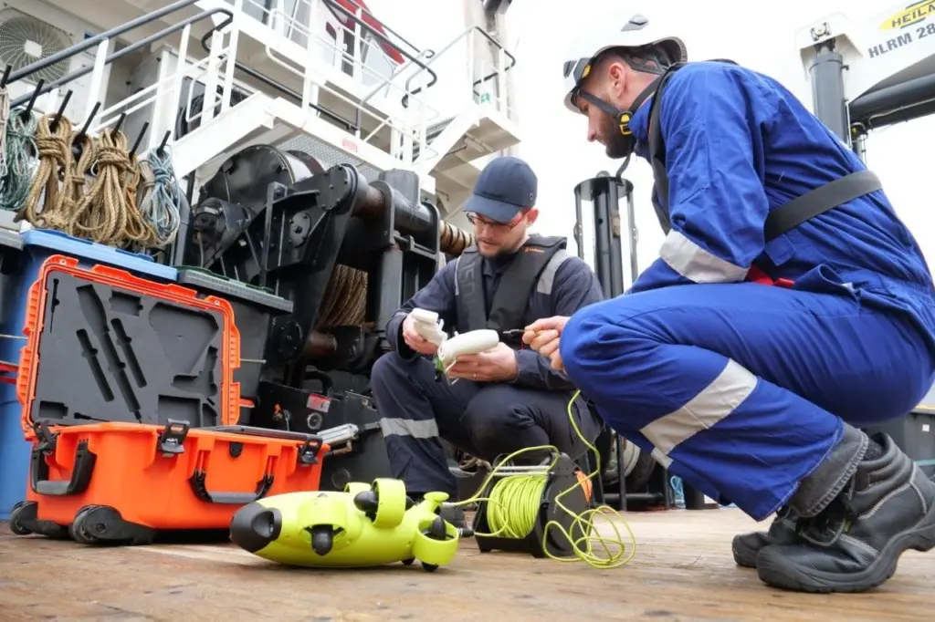 Ned Marine technicians inspect drones offshore