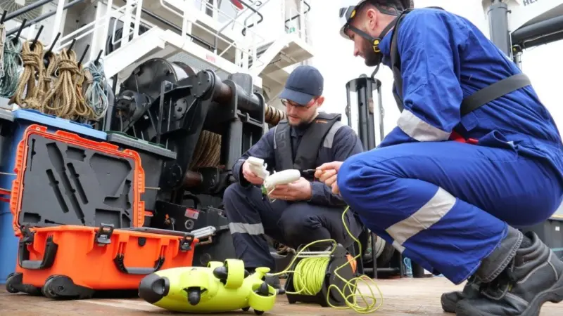 Ned Marine technicians inspect drones offshore