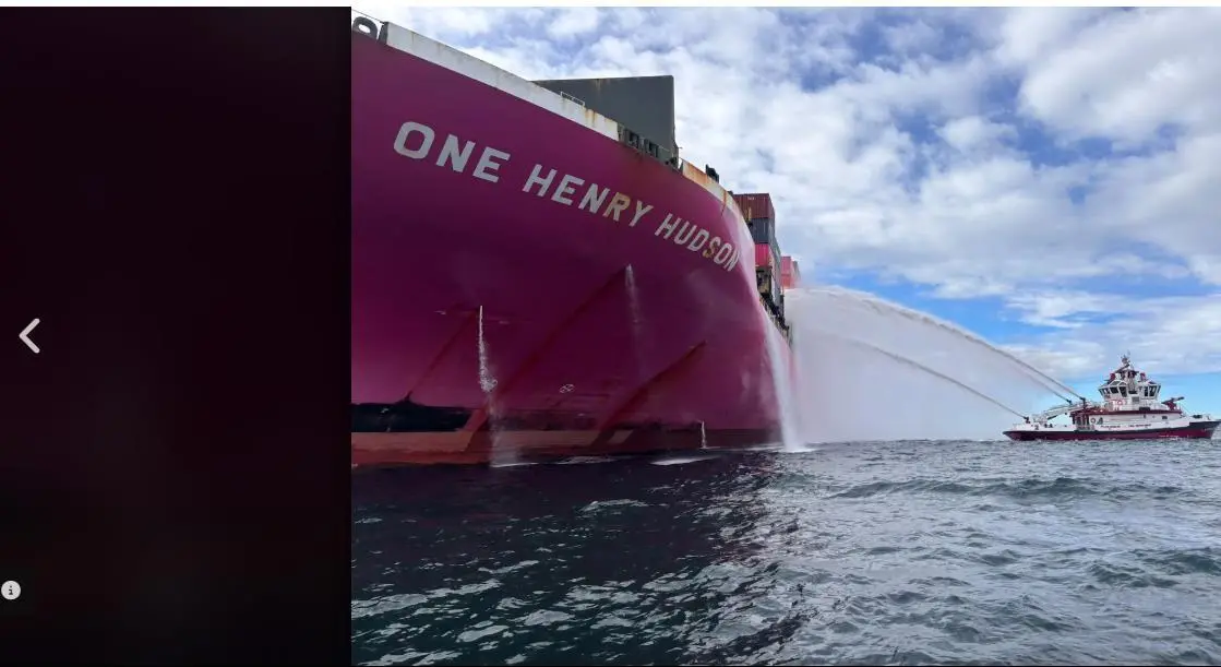 Port tugs were involved in fighting the fire on the container ship (USCG)