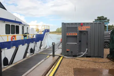 fellten charge qube battery energy storage system next to a crew transfer vessel dockside
